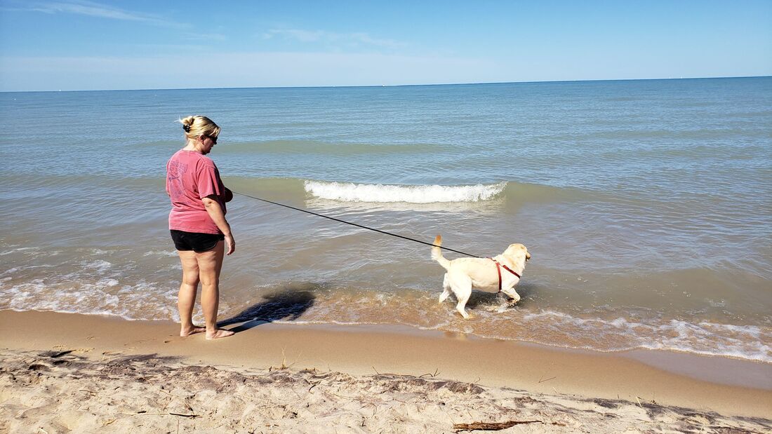 Having fun in Lake MIchigan at North Beach Access in Manistee, Michigan