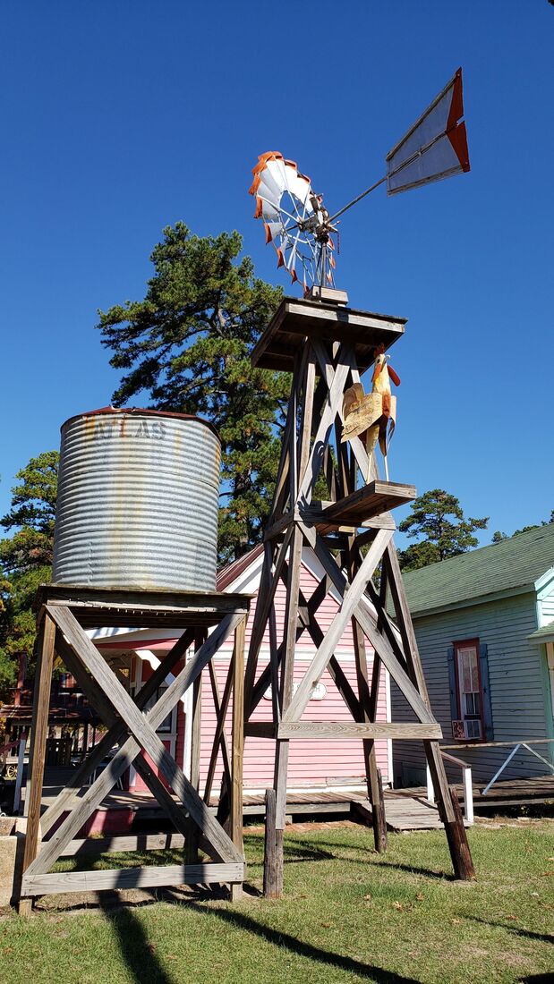 Old wind mill and water tank at Salmon Lake Park in Grapeland TX