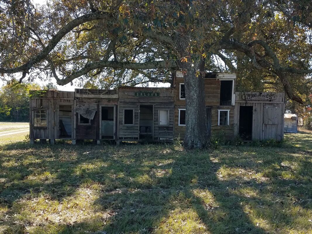 Old west town facade at Salmon Lake Park campground in Grapeland, Texas